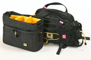a black and yellow duffel bags