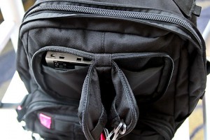 a black backpack with a pocket