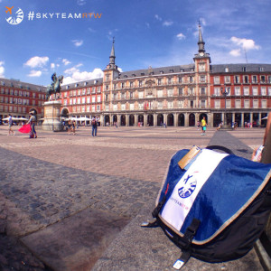 a bag on a bench in front of Plaza Mayor, Madrid