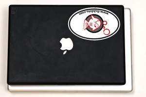 a black laptop with a white logo
