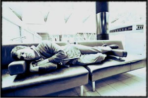 a man lying on a couch