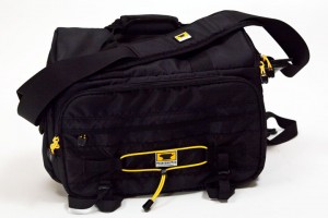 a black bag with yellow straps
