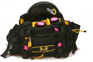a black and yellow bag with a disc in it