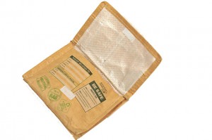 a brown envelope with green labels