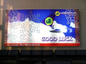 a large billboard with a picture of a plane