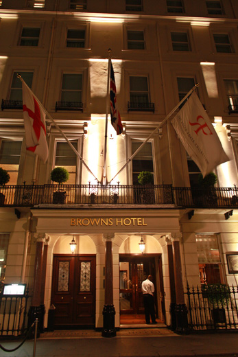 a hotel with flags on the front