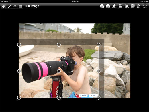 a child holding a camera