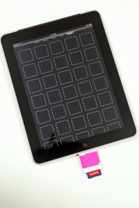 a tablet with a memory card plugged into it