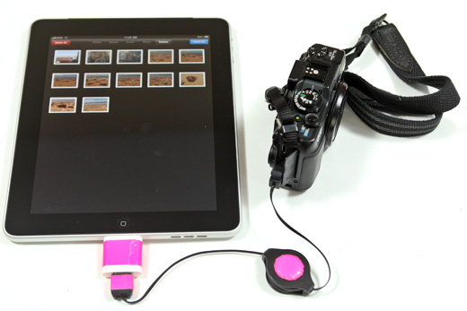 a tablet with a camera connected to it