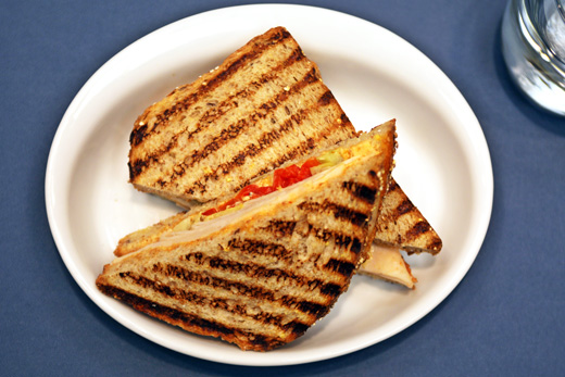a grilled sandwich on a plate