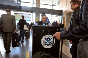 a man looking at a security guard