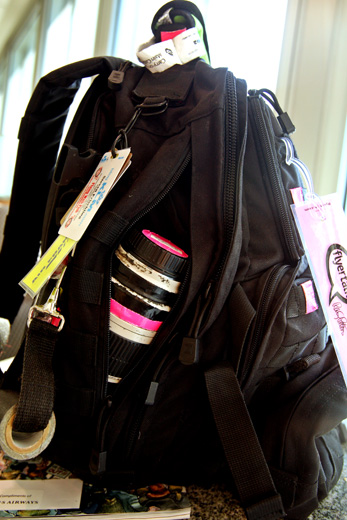 a backpack with a bottle inside