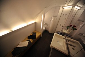 a bathroom with a sink and a bench