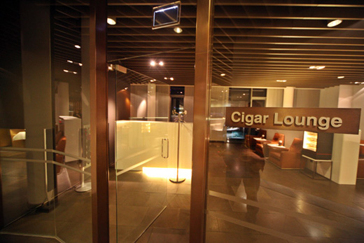 a glass door of a cigar lounge