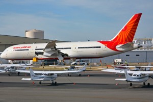 a large white airplane on a runway