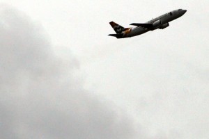 a plane flying in the sky