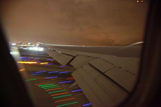 an airplane wing and lights