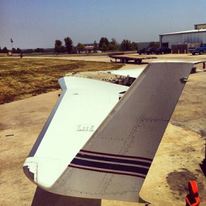 a plane wing on the ground