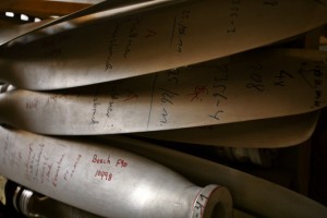 several metal pieces with writing on them