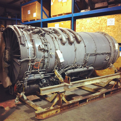 a large grey engine on a pallet