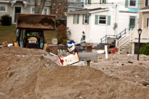 a construction site with a bulldozer and a tractor