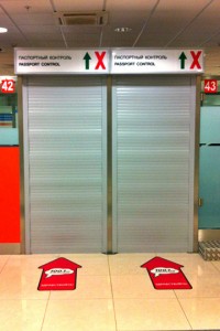 a door with signs and arrows