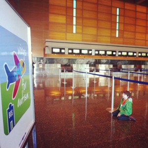 a boy sitting on the floor