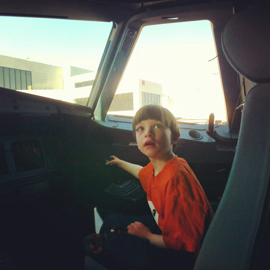 a boy in a plane