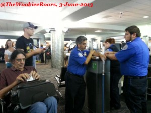 a group of people in a airport
